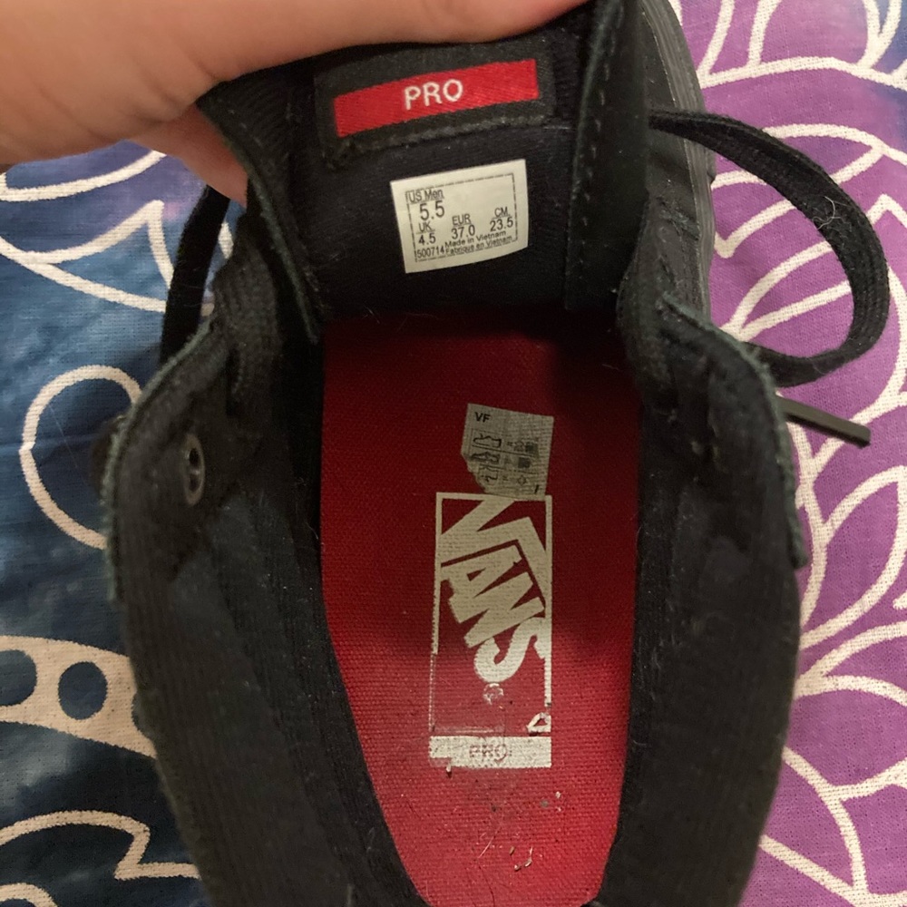 Women’s size 7 Black high top vans